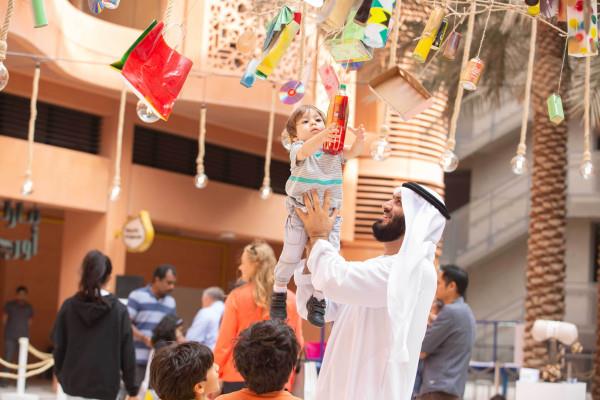 Sustainability-themed community celebration in Masdar City…