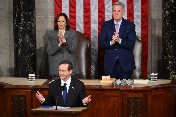US Vice President Kamala Harris and US House Speaker Kevin McCarthy applaud as Israeli