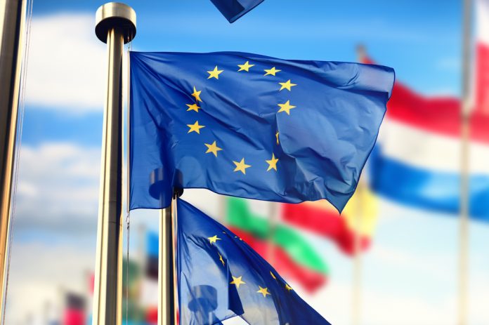 EU flag. Relocation to EU with Union Permits